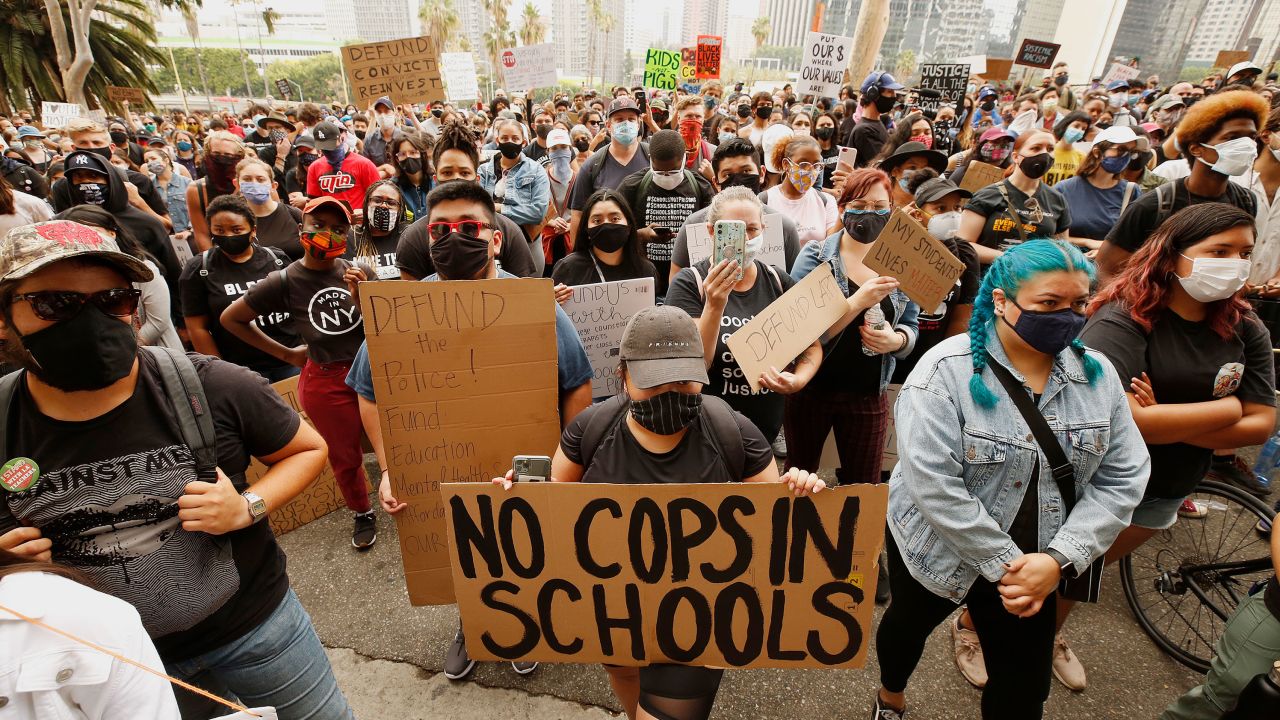 Students and community members gathered outside the Los Angeles Unified School District urging officials to defund its school police.