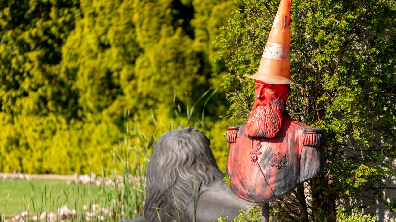 A statue in the grounds of Belgium's Royal Museum for Central Africa, featuring a bust of King Leopold II, was covered in red paint and topped with a traffic cone "dunce's cap."