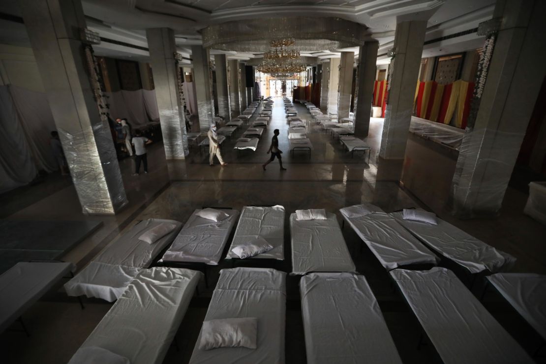 A banquet hall that is normally used for weddings has been converted to makeshift coronavirus hospital as the Indian capital struggles to contain a spike in cases.