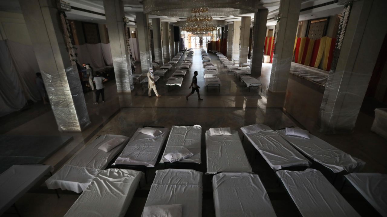 A banquet hall that is normally used for weddings has been converted to makeshift coronavirus hospital as the Indian capital struggles to contain a spike in cases.  