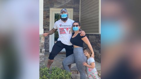 Chad Lail with his wife Stacy and daughter Ava, at their North Carolina home bought sight unseen.