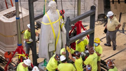 Workers prepare to remove the Jefferson Davis statue from the Kentucky state Capitol in Frankfort, Ky.