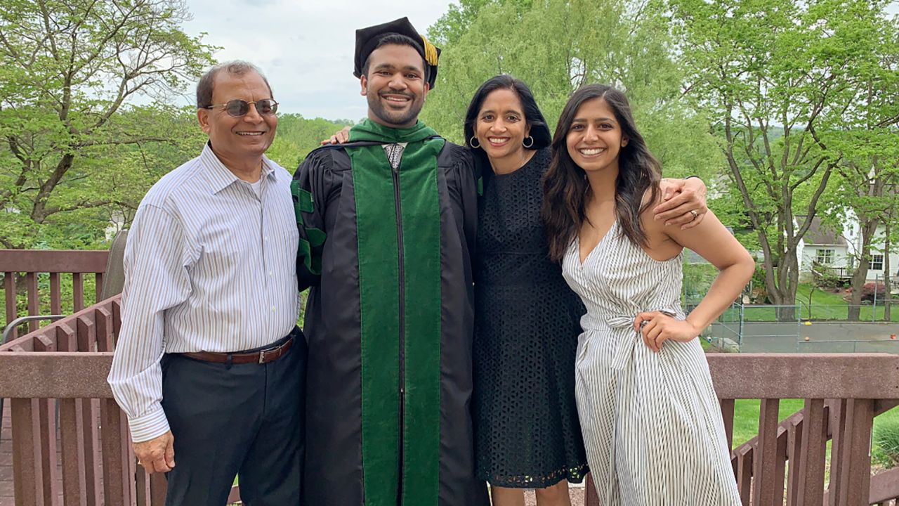 Dr. Vinay Rao graduating at home with his family