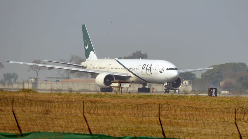 A Pakistan International Airline (PIA) plane taxis on the runway on the way to Saudi Arabia during the PIA employees strike in Islamabad on February 8, 2016.  The strike continued despite Prime Minister Nawaz Sharif's warning that the demonstration was illegal and those taking part could face up to a year in prison under a law that restricts union activity in state-administered sectors. AFP PHOTO / Farooq NAEEM / AFP / FAROOQ NAEEM        (Photo credit should read FAROOQ NAEEM/AFP via Getty Images)