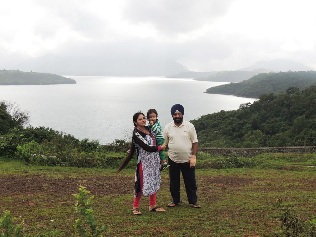 Lakhjeet Singh, 68, tested positive for Covid-19 but couldn't find a hospital to admit him. He is pictured with his daughter and granddaughter.