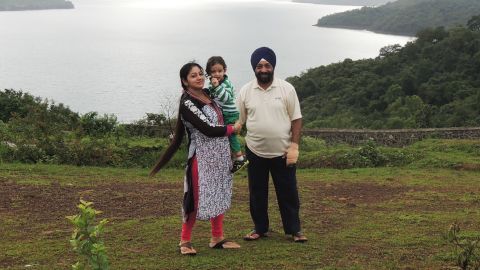 Lakhjeet Singh, 68, tested positive for Covid-19 but couldn't find a hospital to admit him. He is pictured with his daughter and granddaughter.