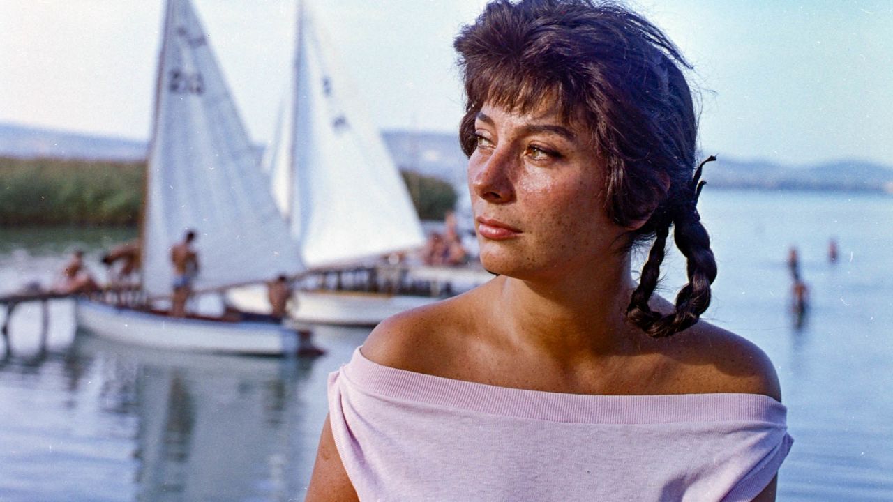 <strong>Golden memories:</strong> Hungary's Lake Balaton has long been a magnet for vacationers, particularly during the communist era of the 1950s to 1980s. Here, Hungarian actress Faragó Vera poses on the lake's shoreline. 