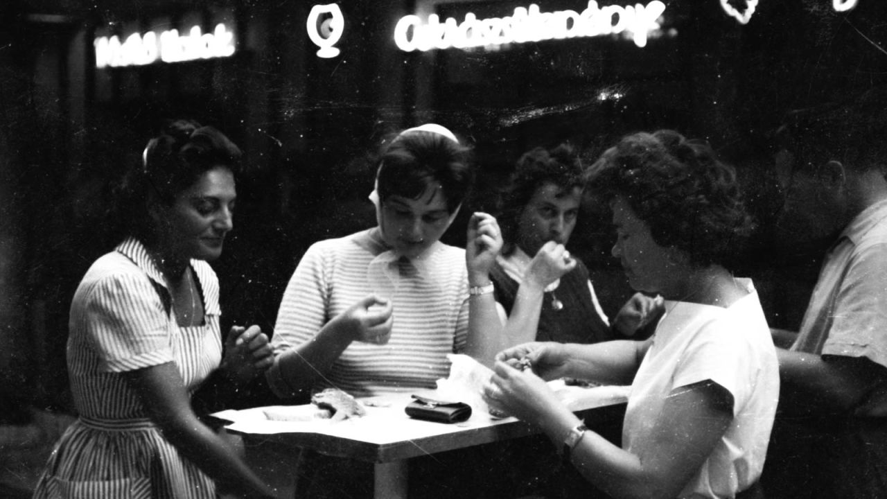 <strong>Days and nights: </strong>A group of women enjoying a snack at a station serving Balaton. Magdi Dorogi, 66, a retired secretary from Budapest, says her summers at Balaton involved days at the beach followed by dinner and socializing in the evening.