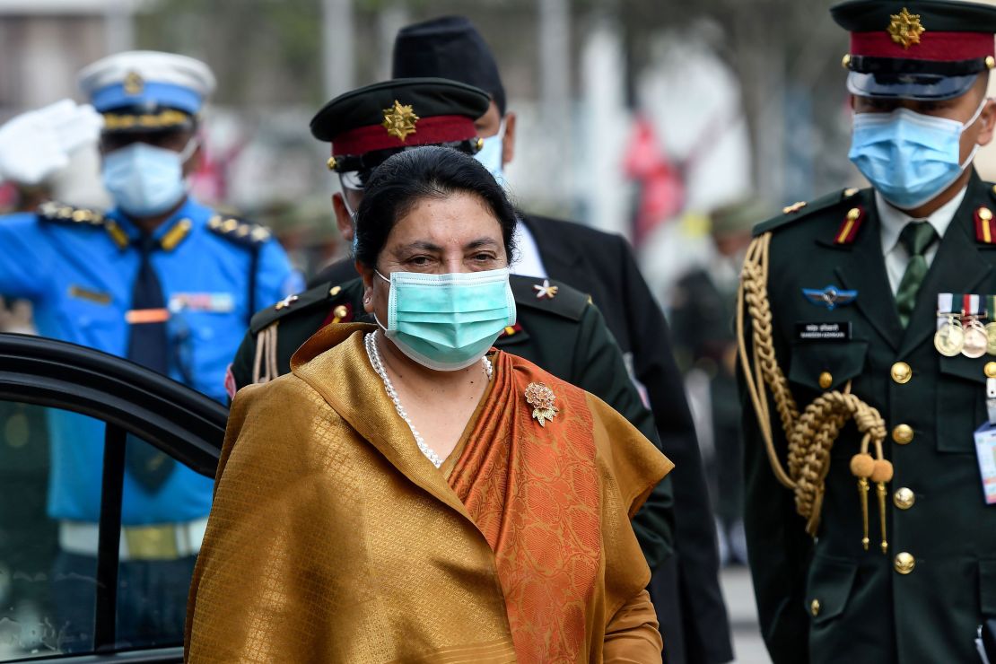 Nepal's leftist President Bidhya Devi Bhandari wore a mask to the parliament in Kathmandu on May 15 to present the new government's program.