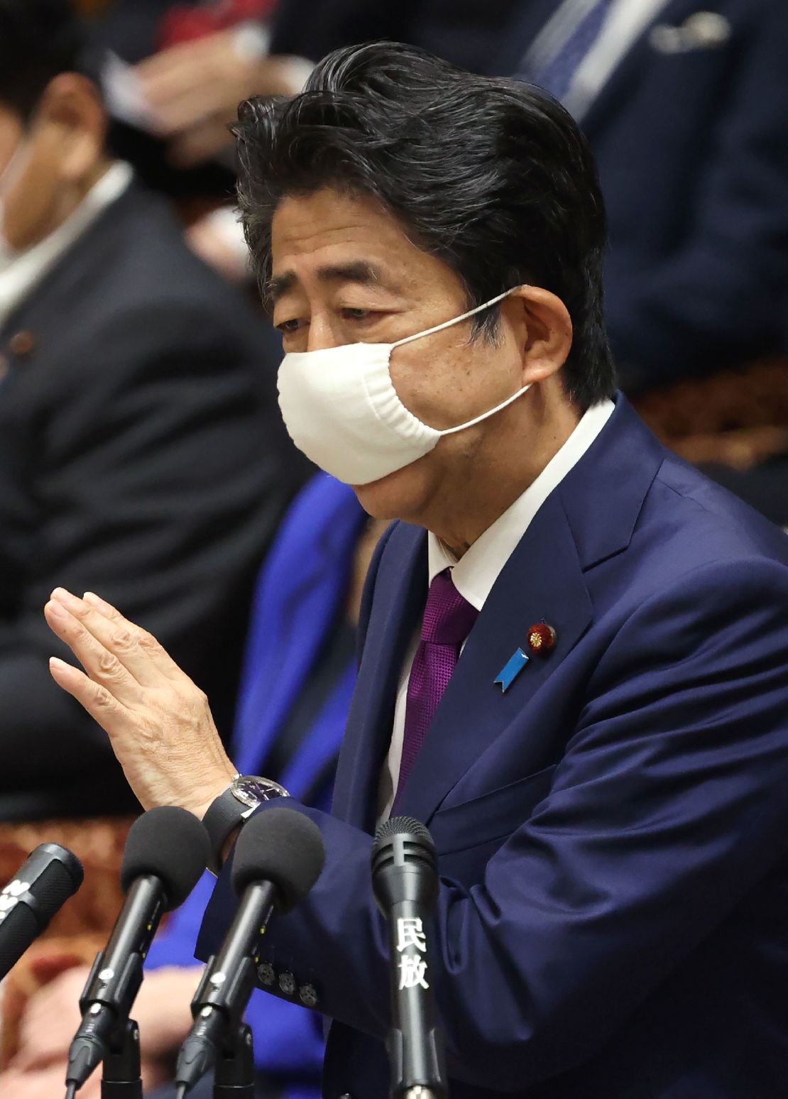 Japan's Prime Minister Shinzo Abe wearing a face mask amid concerns over the spread of coronavirus speaks during a budget committee session in the lower house at parliament in Tokyo on June 10, 2020.