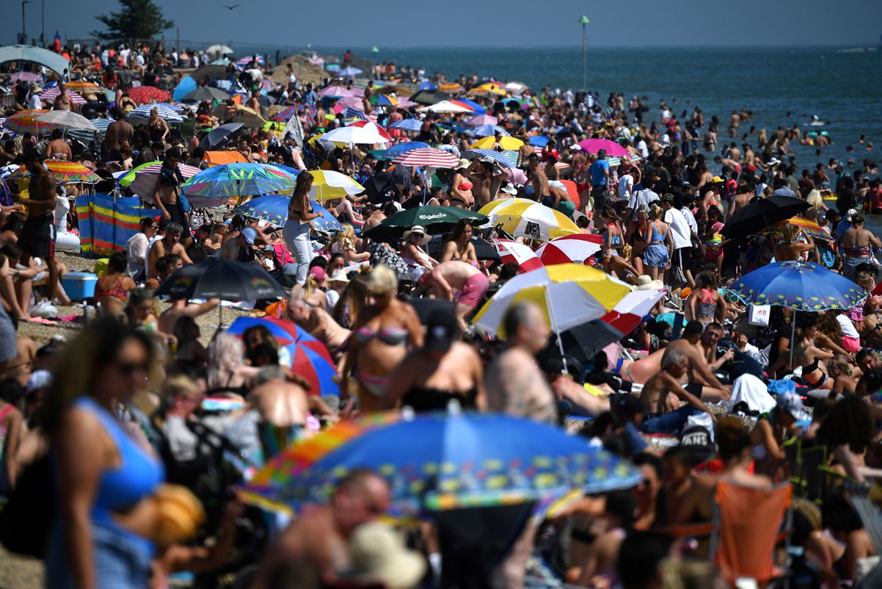 People <a href="https://www.cnn.com/travel/article/bournemouth-major-incident-beaches-scli-intl-gbr/index.html" target="_blank">gather on a beach</a> in Southend-on-Sea, England, on Wednesday, June 24. British Prime Minister Boris Johnson <a href="https://www.cnn.com/2020/05/10/uk/uk-coronavirus-lockdown-boris-johnson-gbr-intl/index.html" target="_blank">began easing coronavirus restrictions in May,</a> but people are still supposed to be distancing themselves from one another.