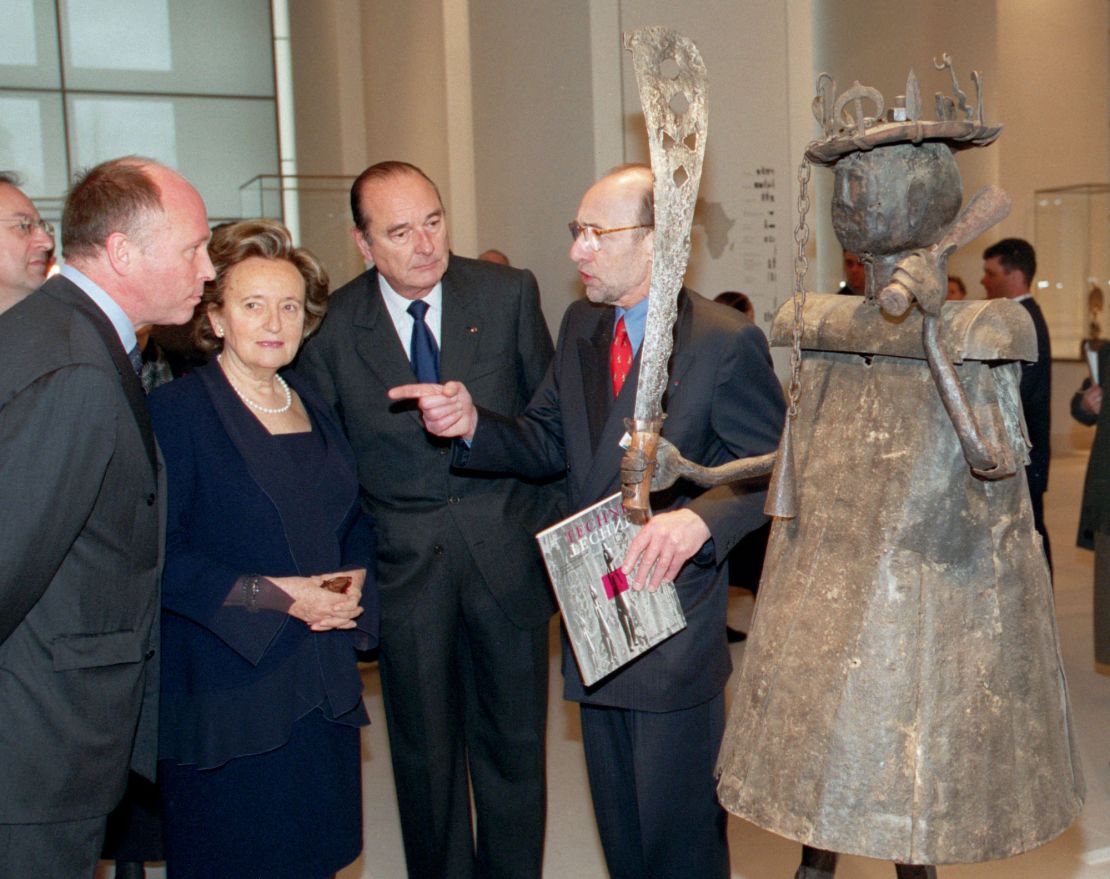 Jacques Kerchache,  right, with former French President Jacques Chirac, second right, during the inauguration of a new wing of the Louvre housing objects from the world's oldest civilizations. 