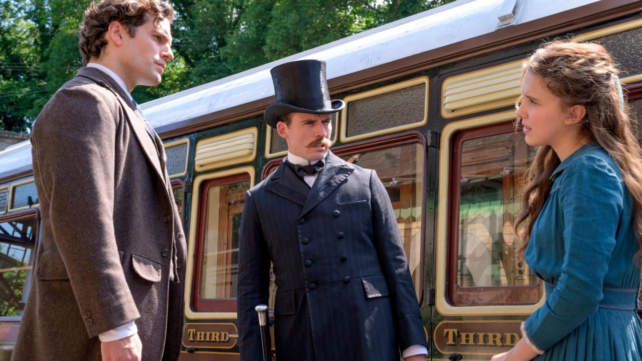 Henry Cavill (L) as Sherlock Holmes in the Netflix film "Enola Holmes."