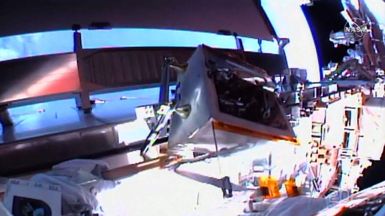 The astronauts have helmet cameras to share their perspective during the spacewalk.