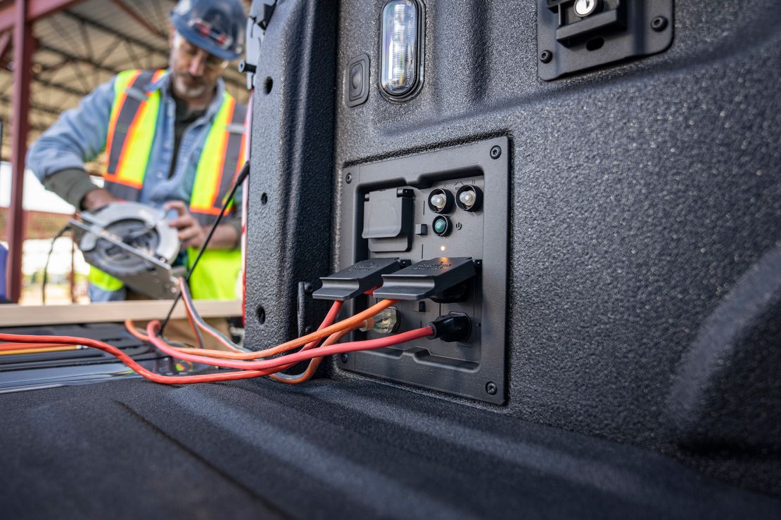 In the hybrid F-150, plugs in the bed can provide power for tools and lights.