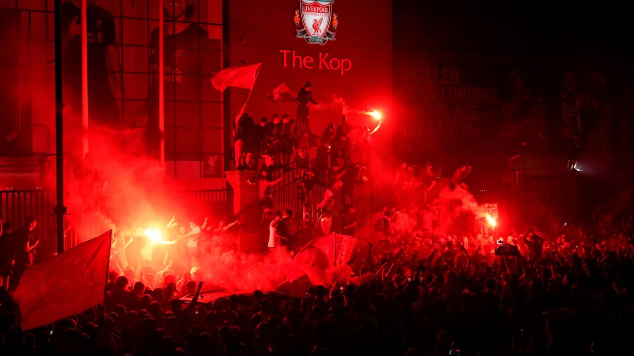 Fans also gathered outside Anfield stadium on Thursday.