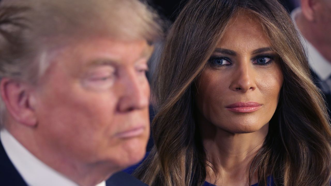 In this March 3, 2016, file photo, Republican presidential candidate Donald Trump and his wife, Melania, greet reporters in the spin room following a debate sponsored by Fox News at the Fox Theatre in Detroit.