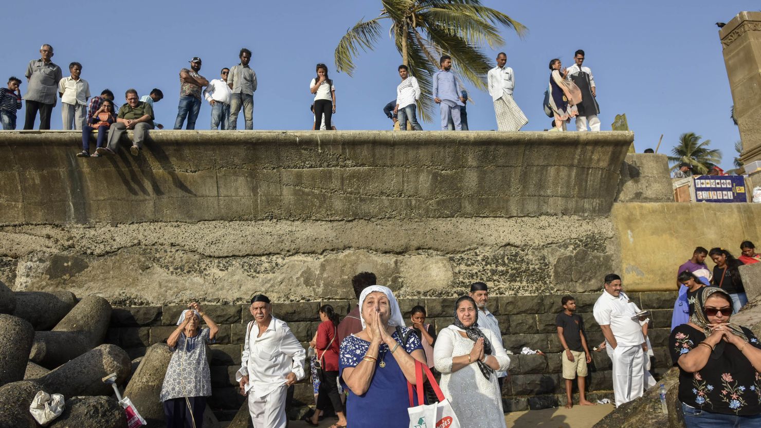 Members of Mumbai's Parsi Zoroastrian community pray at Parsi gate, Marine Drive, for Abangan, a day dedicated to the reverence of water as an element of creation on March 24, 2019.