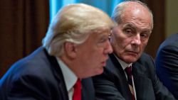 White House chief of staff John Kelly listens as U.S. President Donald Trump speaks at a briefing with senior military leaders in the Cabinet Room of the White House October 5, 2017 in Washington, D.C.