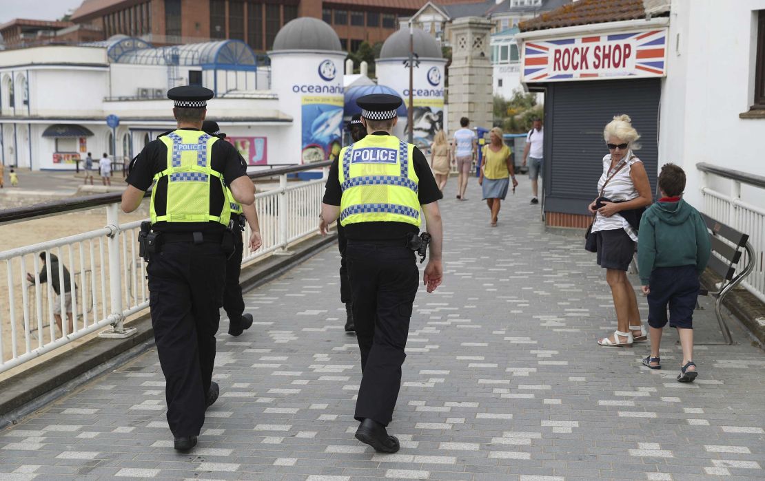 Police patrol near Bournemouth beach on June 26.