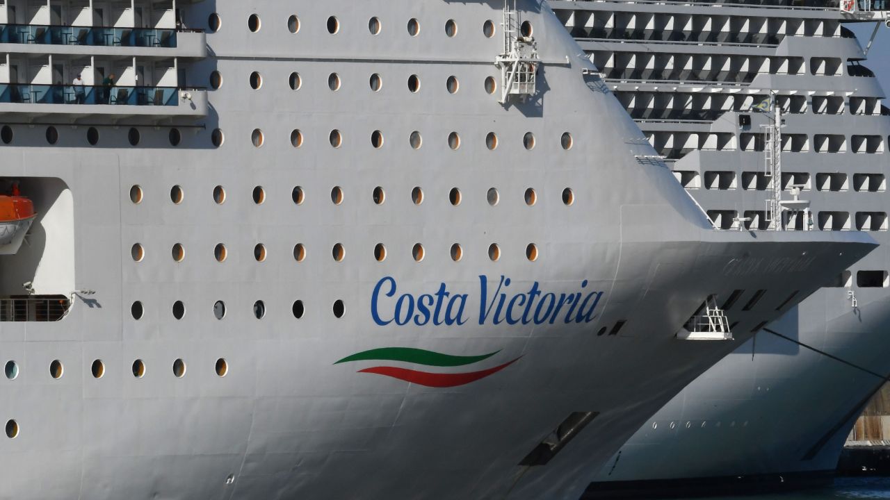 A view shows Italy's Costa Cruises ship Costa Victoria after docking at the port of Civitavecchia, some 70 kms northwest of Rome, on March 25, 2020. - Italy's Costa Cruises said it was isolating more than 700 guests on board its Victoria ship after one of them tested positive for the novel coronavirus. Costa said the Victoria had "726 guests of various nationalities and 776 crew members". (Photo by Andreas SOLARO / AFP) (Photo by ANDREAS SOLARO/AFP via Getty Images)