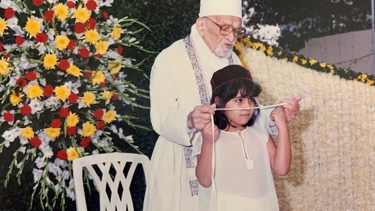 A child undertakes the Zoroastrian initiation  ceremony in Mumbai in 1999.