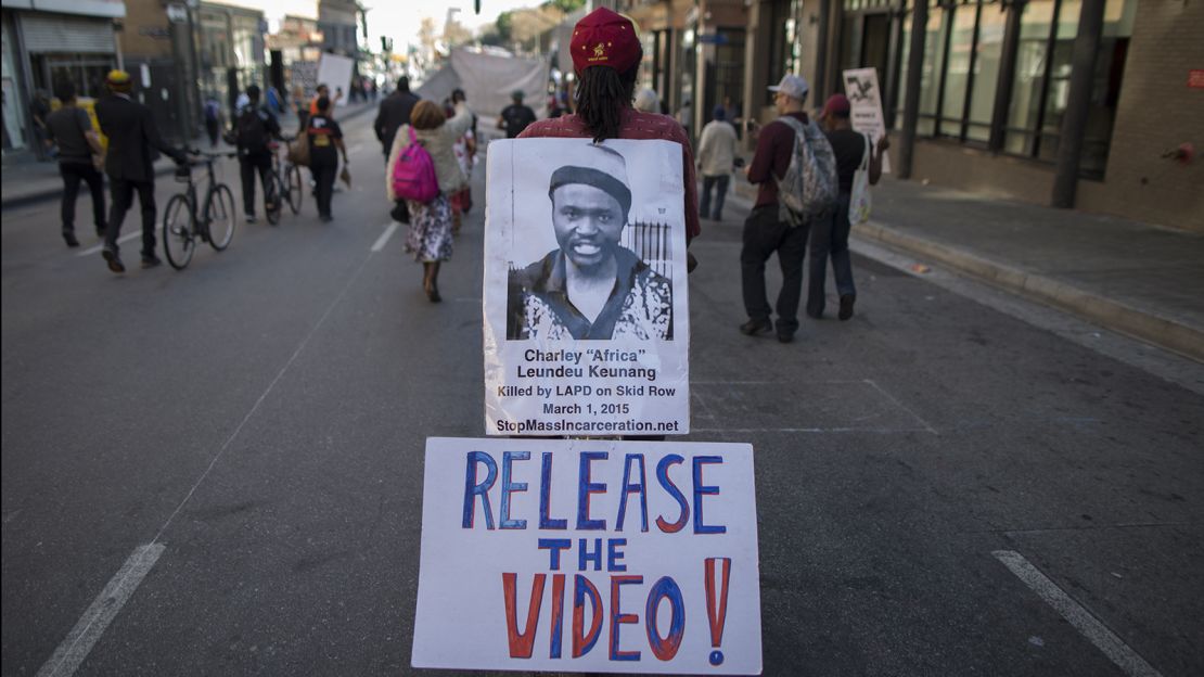 Demonstrators protest police brutality in Los Angeles on October 22, 2015.