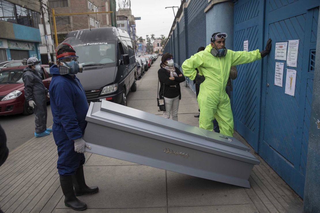 Coffins are brought to a funeral storage facility in Santiago, the capital of Chile, on June 19, 2020.