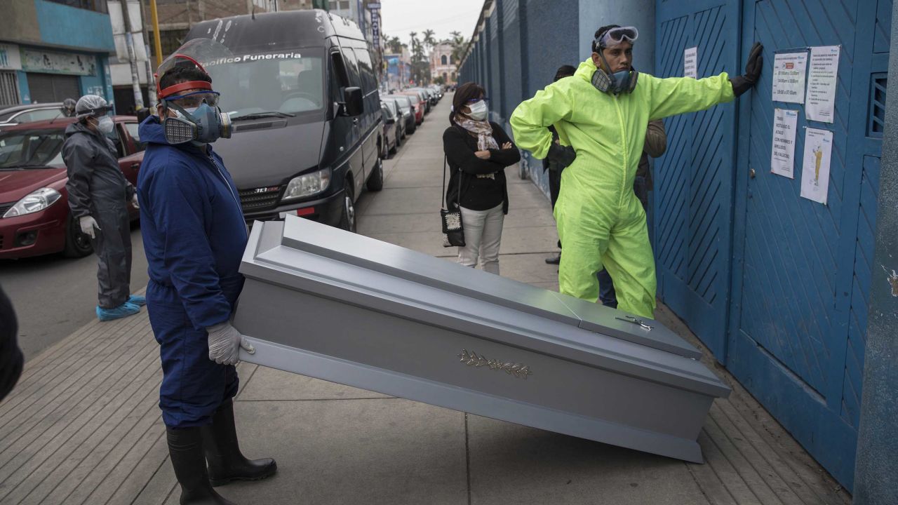Coffins are brought to a funeral storage facility in Santiago, the capital of Chile, on June 19, 2020.  