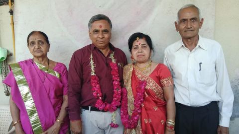 Natubhai Patel (far right) and his wife, Sheela Patel (far left) with a couple he introduced. Patel started his non-profit dating service, Anubandh Foundation, after the 2001 earthquake in Gujarat.