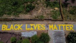 An aerial photo shows a mural reading "Black Lives Matter" painted on a bike path on June 19, 2020, in Atlanta, Georgia. 