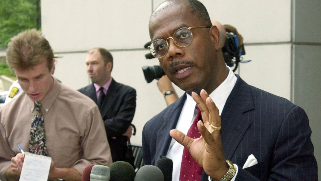 Fulton County District Attorney Paul Howard addresses members of the media outside of Fulton County Superior Court in Atlanta after Ray Lewis pleaded quilty to a misdemeanor in June 2000.