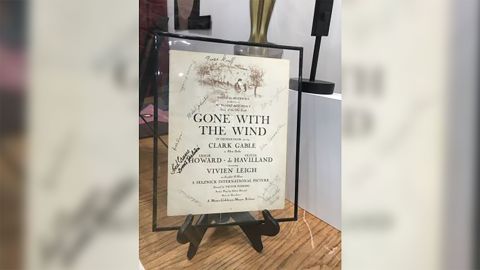 A "Gone with the Wind" movie poster at the Road to Tara museum, signed by Black actors who were extras in the film.