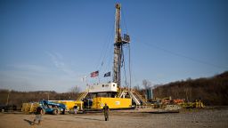 A natural gas drilling rig stands on a Chesapeake Energy Corp. drill site in Bradford County, Pennsylvania, U.S., on Tuesday, April 6, 2010. Companies are spending billions to dislodge natural gas from a band of shale-sedimentary rock called the Marcellus shale that underlies Pennsylvania, West Virginia and New York. The band of rock, so designated because it pokes through near a city of that name in northern New York, may contain 262 trillion cubic feet of recoverable gas, the U.S. Department of Energy estimates. Photographer: Daniel Acker/Bloomberg via Getty Images