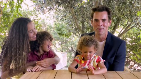 Jason Thompson accepts an award with his family during the Daytime Emmy Awards.