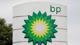A BP Plc logo sits on a totem sign at filling station in Cambridge, U.K., on Monday, June 8, 2020. BP Plc plans to cut 10,000 jobs as the coronavirus pandemic accelerates the company's move to slim down for the energy transition. Photographer: Jason Alden/Bloomberg/Getty Images