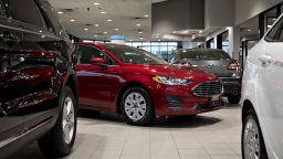 A 2019 Ford Motor Co. Fusion vehicle sits on display at a car dealership in Orland Park, Illinois, U.S., on Friday, Sept. 27, 2019. Auto sales in the U.S. probably took a big step back in September, setting the stage for hefty incentive spending by carmakers struggling to clear old models from dealers' inventory. Photographer: Daniel Acker/Bloomberg via Getty Images