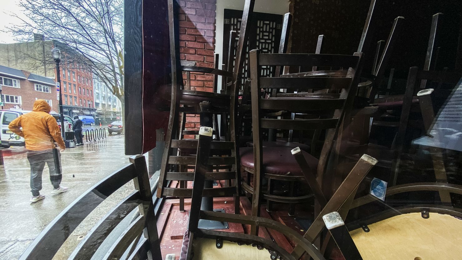 Chairs and tables are pilled in a restaurant that was shuttered due to the coronavirus outbreak on March 23, 2020 in Hoboken, New Jersey.