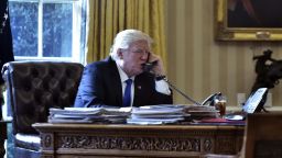 Trump speaks on the phone with Russia's President Vladimir Putin from the Oval Office of the White House in January 2017.
