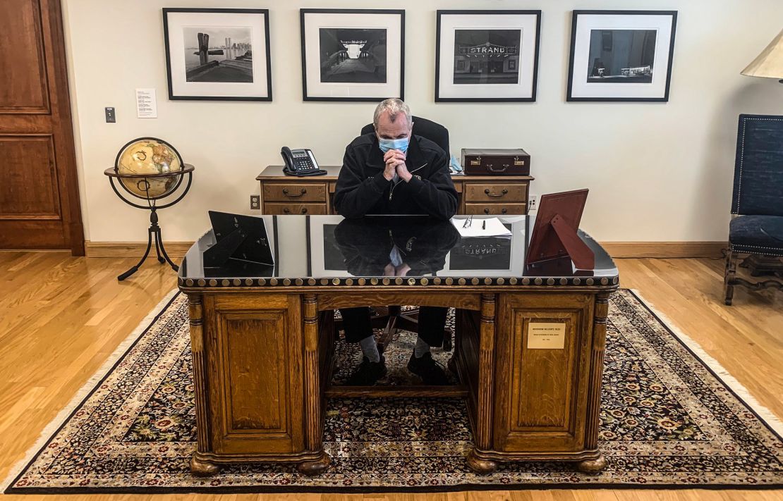 New Jersey Gov. Phil Murphy tweeted this picture of him taking a moment of silence for George Floyd on June 4 as he sits behind a desk that once belonged to Woodrow Wilson. 