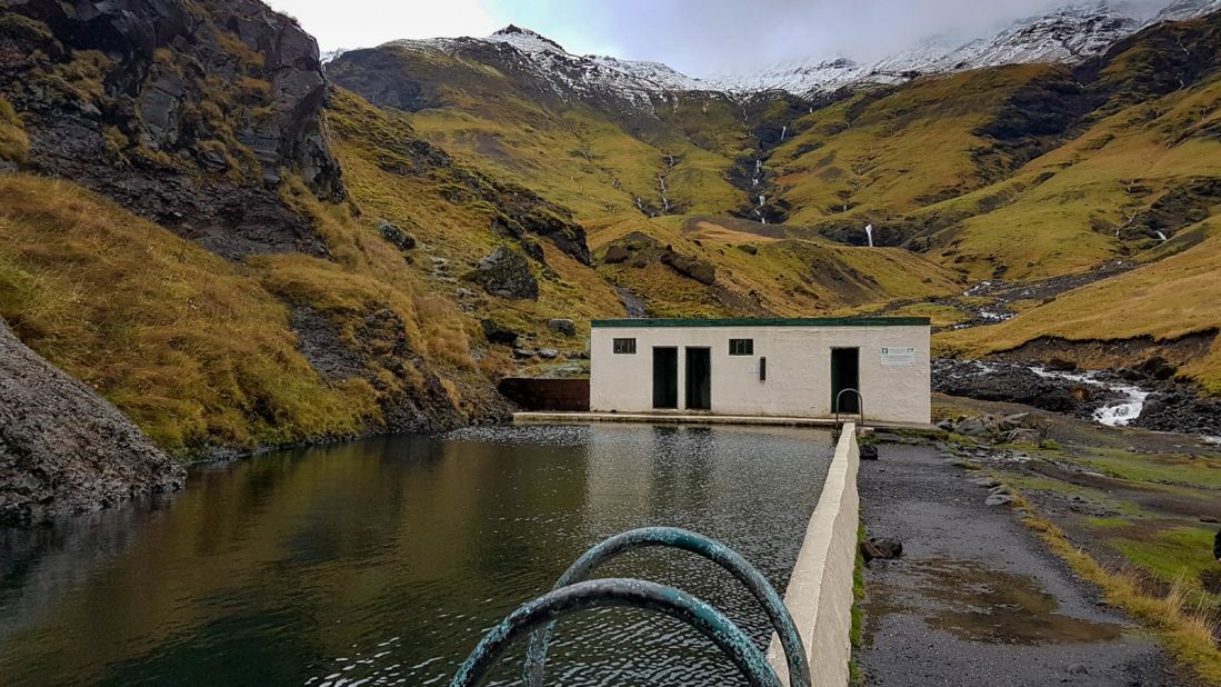 <strong>Seljavallalaug, Iceland:</strong> The changing room block is grimly rudimentary, but who cares when the views from the pool are like this. A geothermic spring raises the temperature to pleasant levels.
