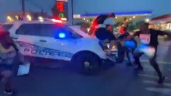 detroit police drive into protesters