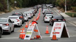Motorists line up at a coronavirus testing site at Dodger Stadium Monday, June 29, 2020, in Los Angeles. 