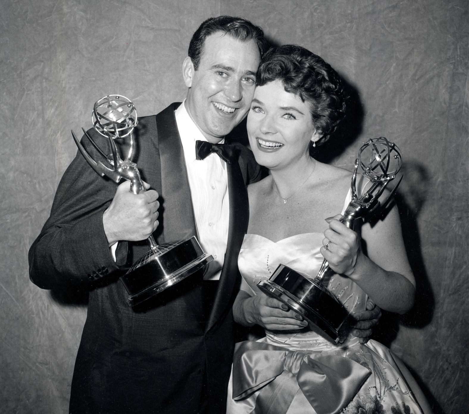 Reiner and Polly Bergen pose with their statuettes at the 1958 Emmy Awards in New York. Reiner won the Emmy for best continuing supporting performance by an actor in drama or comedy for "Caesar's Hour."