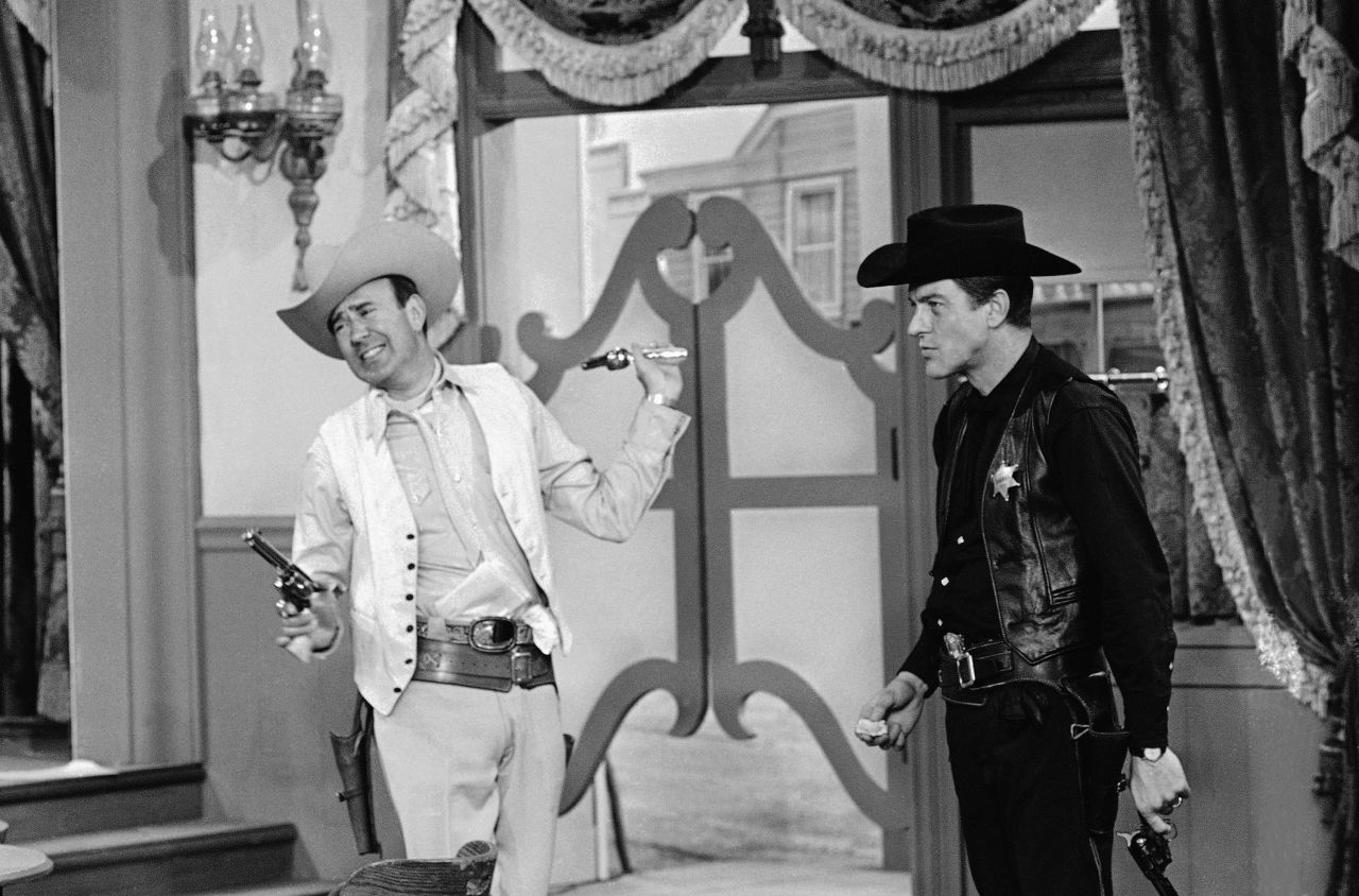 Pictured here -- during a scene from "The Gunslinger" episode on "The Dick Van Dyke Show" -- are Reiner, left, and Dick Van Dyke. Reiner is in the role of Alan "Big Bad" Brady, while Van Dyke plays a small-town sheriff named Rob Petrie. Reiner had a hand in writing many of the show's scripts.