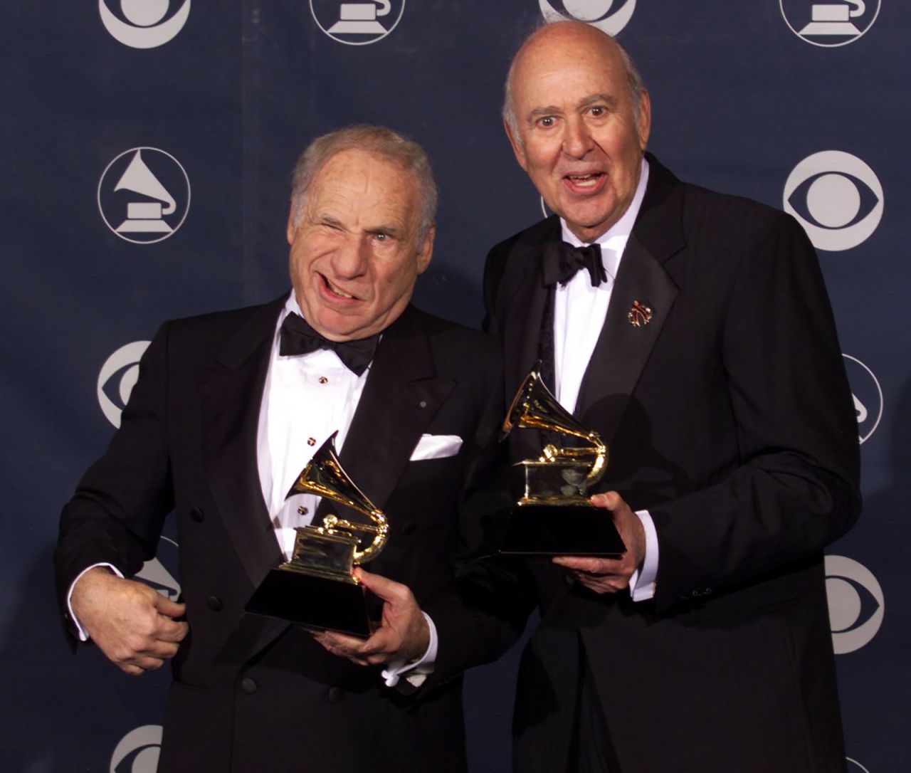 Mel Brooks, left, and Reiner pose with their 1999 Grammy Awards in Los Angeles. They won for "The 2000 Year Old Man in the Year 2000" in the best spoken comedy album category.
