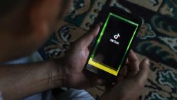 A man uses TIKTOk on his mobile phone in Srinagar,  Jammu and Kashmir,  India on 30 June 2020 (Photo by Nasir Kachroo/NurPhoto/Getty Images)