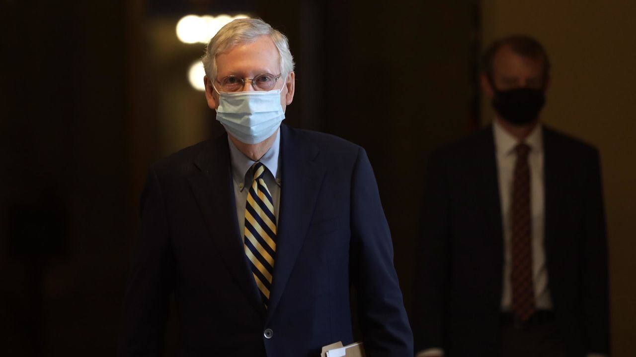 Senate Majority Leader Sen. Mitch McConnell (R-KY) wears a mask as he walks through a hallway at the U.S. Capitol May 11, 2020 in Washington, DC.