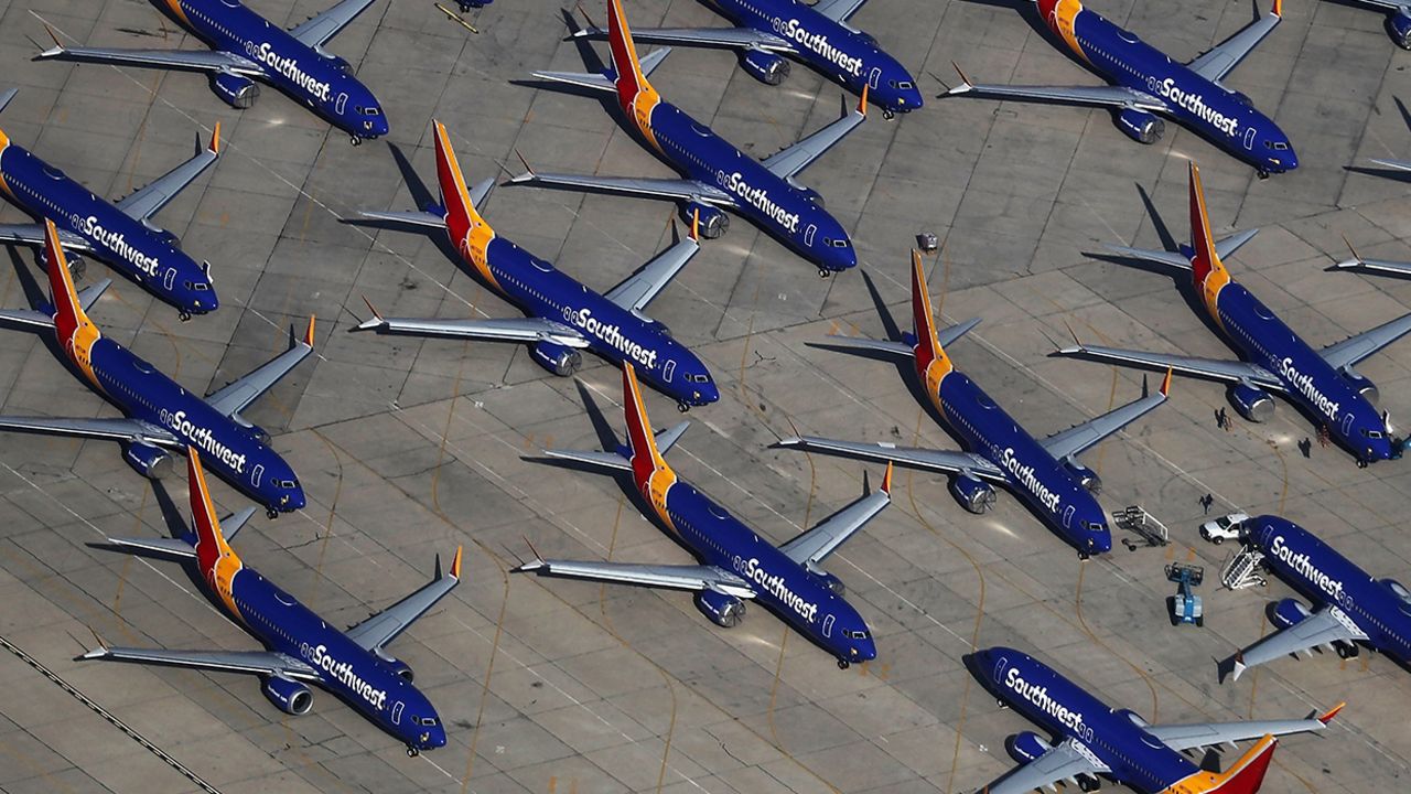 In this March 27, 2019, file photo, a number of Southwest Airlines Boeing 737 Max aircraft are parked at Southern California Logistics Airport in Victorville, California. 