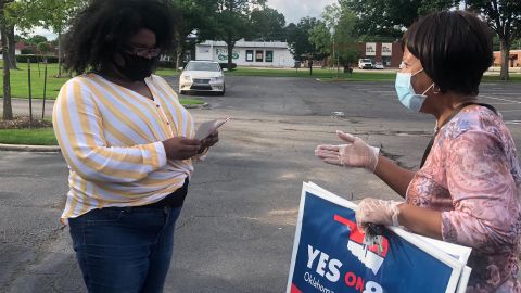 Medicaid expansion supporters meet with voters in Oklahoma.